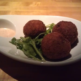 Salty Sow - Oyster stuffed boudin - American Near Me - Austin, Texas