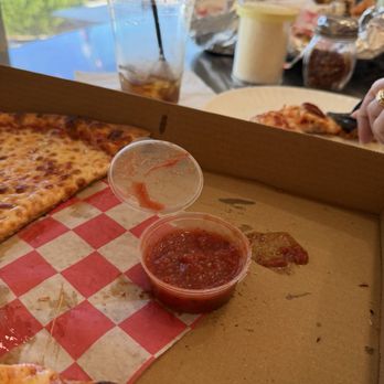 Upper Crust Pizza - A little tiny serving of sauce for $1.02.  Ridiculous - Pizza Near Me - Winter Haven, Florida