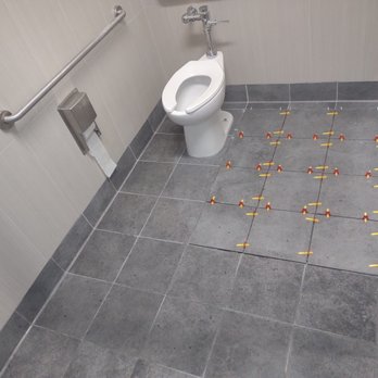 HPLI Services - a toilet in a public restroom - Plumbing Near Me HPLI Services - a toilet in a public restroom - Plumbing Near Me
