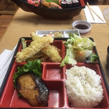 Restaurant Kunio - Miso butterfish and mixed tempura. Lunch special on what looks like a mini size of the party boat. - Japanese Near Me - Waipahu, Hawaii Restaurant Kunio - Miso butterfish and mixed tempura. Lunch special on what looks like a mini size of the party boat. - Japanese Near Me - Waipahu, Hawaii