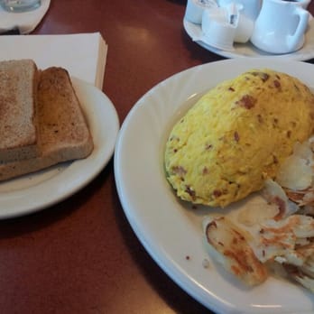 Lume's Pancake House - Bacon and cheese omelette with wheat toast and hash browns. - Pancakes Near Me - Chicago, Illinois Lume's Pancake House - Bacon and cheese omelette with wheat toast and hash browns. - Pancakes Near Me - Chicago, Illinois