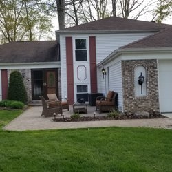Rock Botton Lawn and Landscaping - We have a flower bed in front of our home. we would like help with a new design. We also have 3 small tree/shrub stumps to be removed.