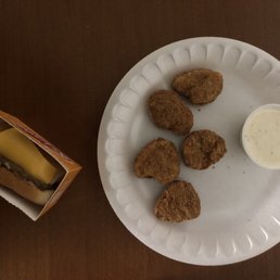 a plate of food and a cup of sauce a plate of food and a cup of sauce