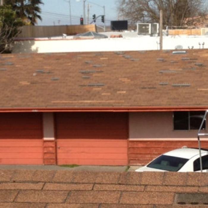 Slide of Steele's Roofing Company