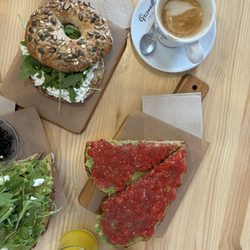 Café ArtySana - Crema Bagel, avocado toast with feta and spinach, and avocado and tomato toast
