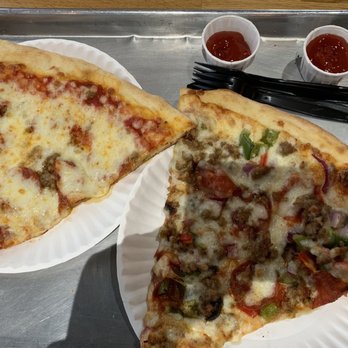 Times Square Kitchen - Sausage & Supreme Pizza - Salad Near Me - Owings Mills, Maryland Times Square Kitchen - Sausage & Supreme Pizza - Salad Near Me - Owings Mills, Maryland