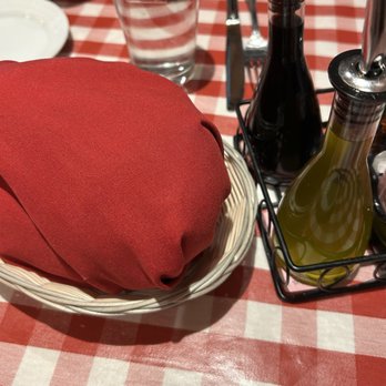Frugatti's - Bread came, and kept warm in the napkin. Olive oil & vinegar accompanied. - Italian Near Me - Bakersfield, California Frugatti's - Bread came, and kept warm in the napkin. Olive oil & vinegar accompanied. - Italian Near Me - Bakersfield, California