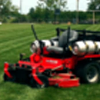 Superior Lawns - a man mowing a field - Landscaping Near Me - Sedalia, Missouri Superior Lawns - a man mowing a field - Landscaping Near Me - Sedalia, Missouri