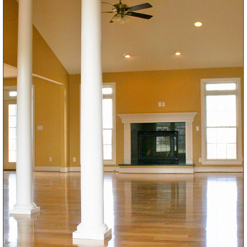 Leader Construction - an empty living room with a fireplace - General Contractors Near Me - Saint Charles, Missouri Leader Construction - an empty living room with a fireplace - General Contractors Near Me - Saint Charles, Missouri