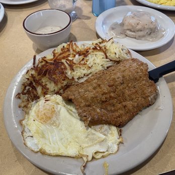 Country Kitchen - Chicken fried steak and eggs with a sauce of sausage and gravy. - New American Near Me - Big Bear Lake, California