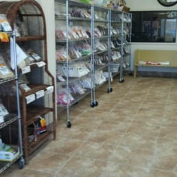 a store with shelves of goods a store with shelves of goods