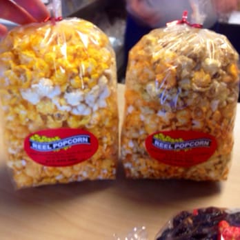 Reel Popcorn - Cheese mix on the left, cheddar bacon/caramel mix on the right. Both small bags. - Popcorn Shops Near Me - Austin, Texas