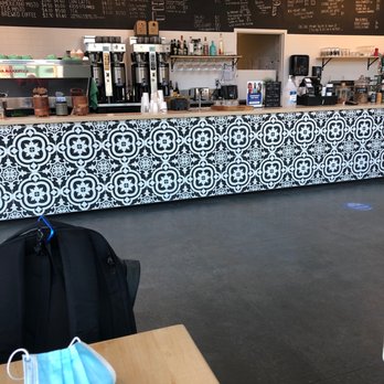 Gravity Espresso & Wine Bar - the counter with masks on - Coffee & Tea Near Me - Calgary, Alberta
