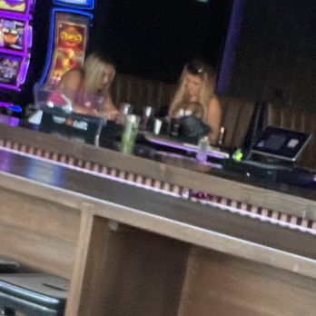 Bottoms Up Bar & Lounge - two women sitting at the bar - Bars Near Me - Schiller Park, Illinois