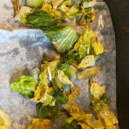 Half of the discarded lettuce from my Chicken Caesar Salad Wrap