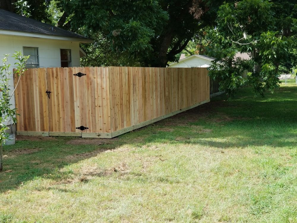 Slide of Pride of Texas Roof and Fence