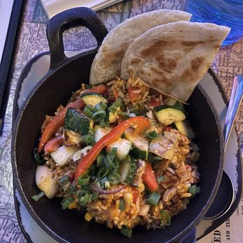 Roam by San Chez - Jollof Rice - New American Near Me - Grand Rapids, Michigan Roam by San Chez - Jollof Rice - New American Near Me - Grand Rapids, Michigan