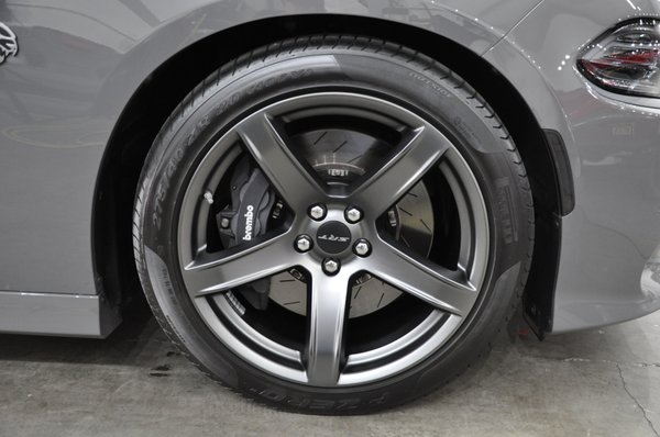 Photo of Immaculate Reflections Auto Detailing - Brentwood, CA, US. Full paint correction and CQuartz Finest Reserve ceramic coating on paint/wheels/calipers of this new Charger Hellcat