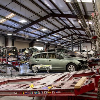 G&C Auto Body - Main shop floor with frame puller in foreground - Body Shops Near Me - Santa Rosa, California G&C Auto Body - Main shop floor with frame puller in foreground - Body Shops Near Me - Santa Rosa, California