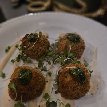 Relic Speakeasy - Gourmet seasonal risotto balls--crispy, cozy, and packed with rich, rotating flavors inspired by the season. - Lounges Near Me - Coeur d'Alene, Idaho Relic Speakeasy - Gourmet seasonal risotto balls--crispy, cozy, and packed with rich, rotating flavors inspired by the season. - Lounges Near Me - Coeur d'Alene, Idaho