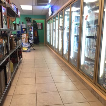 Liquor Depot - a row of coolers in a store - Beer, Wine & Spirits Near Me - Giddings, Texas Liquor Depot - a row of coolers in a store - Beer, Wine & Spirits Near Me - Giddings, Texas