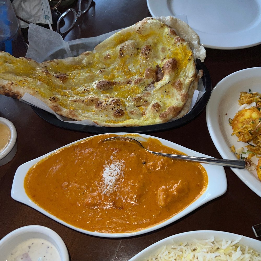 The Cliff Restaurant & Bar - Garlic naan Coconut chicken w/ basmati - Sports Bars Near Me - Medicine Hat, Alberta The Cliff Restaurant & Bar - Garlic naan Coconut chicken w/ basmati - Sports Bars Near Me - Medicine Hat, Alberta