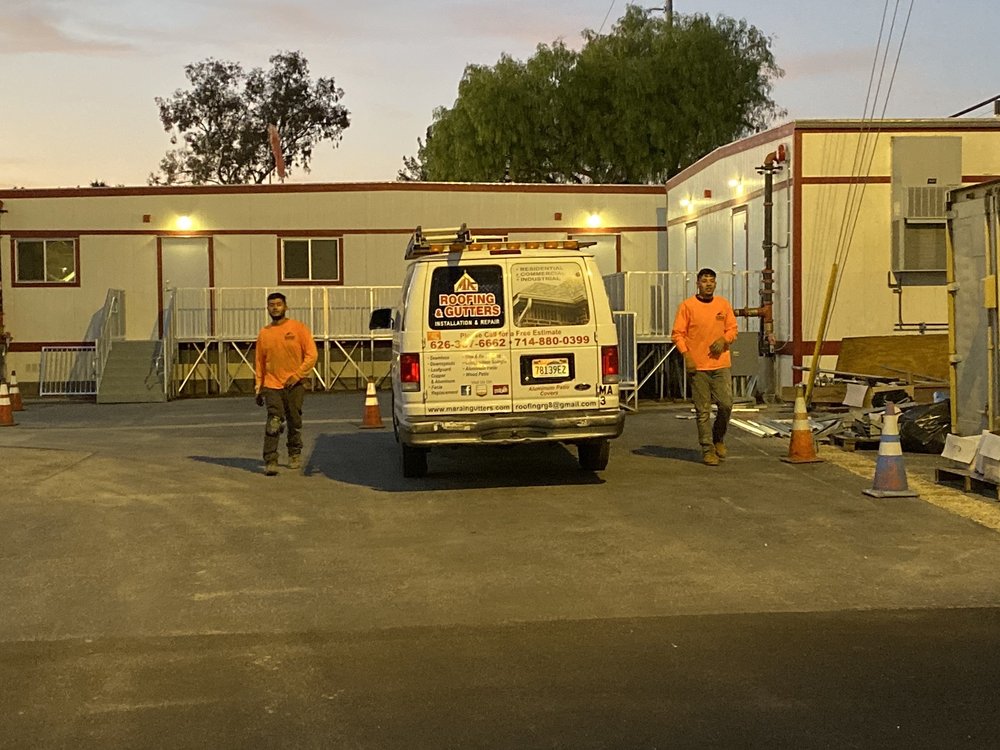 Slide of MA Rain Gutters