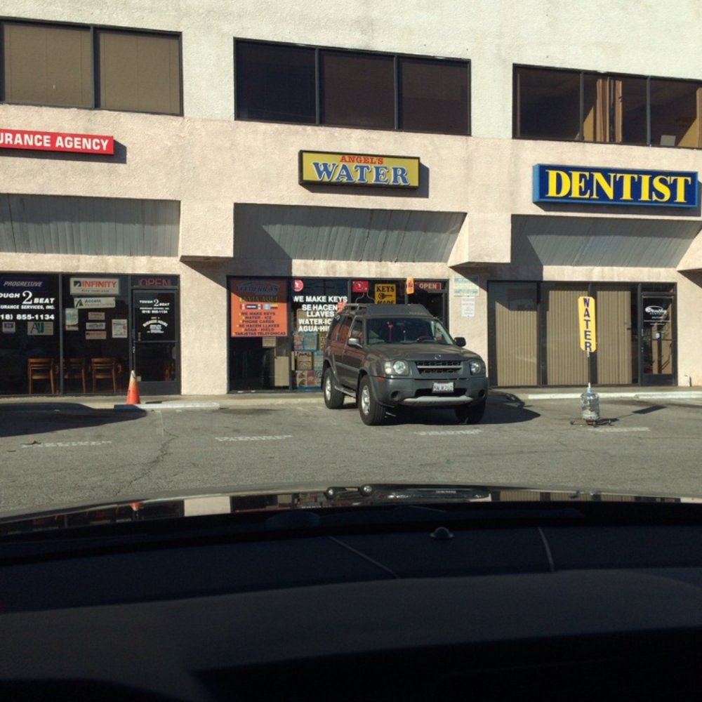 Angel's Water - a car parked in front of a dentist's office - Water Stores Near Me - Van Nuys, California
