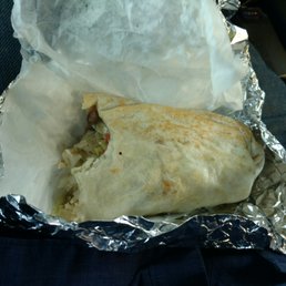 a burrito wrapped in aluminum foil