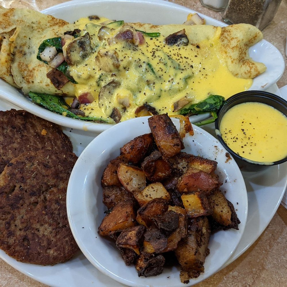 Spinach omelette, home fries, impossible sausage. Spinach omelette, home fries, impossible sausage.