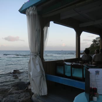 Mim's Seaside Bistro - The deck area that is covered - Seafood Near Me - St Thomas, Virgin Islands Mim's Seaside Bistro - The deck area that is covered - Seafood Near Me - St Thomas, Virgin Islands