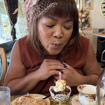 Coterie Tea & Eatery - A cute birthday brownie with a candle. - Tea Rooms Near Me - Upland, California Coterie Tea & Eatery - A cute birthday brownie with a candle. - Tea Rooms Near Me - Upland, California