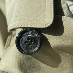 Lapels Dry Cleaning - Looks like a 3yr old glued it back