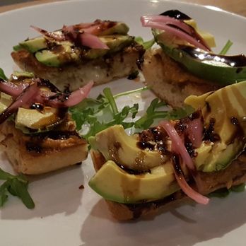 Stage Restaurant - Avacado Toast. Usually two per order but they cut it in half for us since we had a party of four. Half was plenty! - New American Near Me - Honolulu, Hawaii Stage Restaurant - Avacado Toast. Usually two per order but they cut it in half for us since we had a party of four. Half was plenty! - New American Near Me - Honolulu, Hawaii