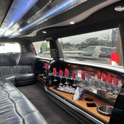 Fantasy Line Limousine - Our 12 mother of pearl Navigator SUV Stretch Limousine
