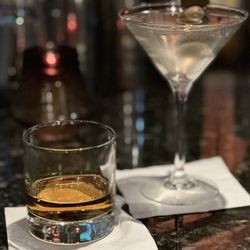 Steakhouse 85 - Dirty martini and glass of whiskey
