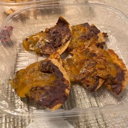Supposed to be nachos no onions no guacamole no nothing absolute shit