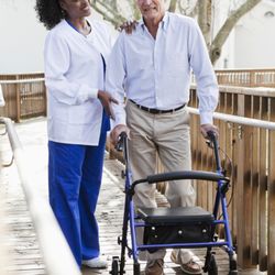 Aides and Companions - Aide taking a walk with client
