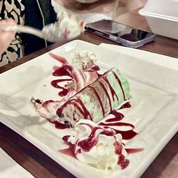 Spumoni ice cream with claret sauce
