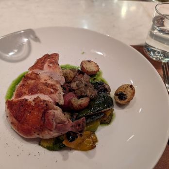 Luke's Kitchen and Bar - Airline chicken with roasted potatoes and grilled vegetables. 26 dollars - Seafood Near Me - Orlando, Florida Luke's Kitchen and Bar - Airline chicken with roasted potatoes and grilled vegetables. 26 dollars - Seafood Near Me - Orlando, Florida