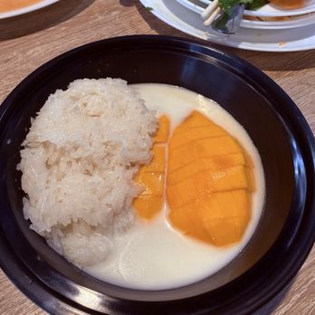 Lao'd District - MANGO STICKY RICE (cold firm and very runny) - Thai Near Me - Houston, Texas Lao'd District - MANGO STICKY RICE (cold firm and very runny) - Thai Near Me - Houston, Texas