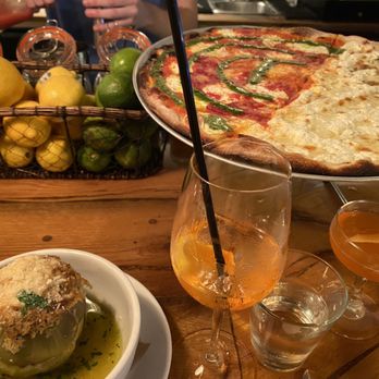 Rubirosa - Stuffed Artichoke, Half Tie-Dye/ Half Bianca Pizza - Italian Near Me - New York, New York Rubirosa - Stuffed Artichoke, Half Tie-Dye/ Half Bianca Pizza - Italian Near Me - New York, New York