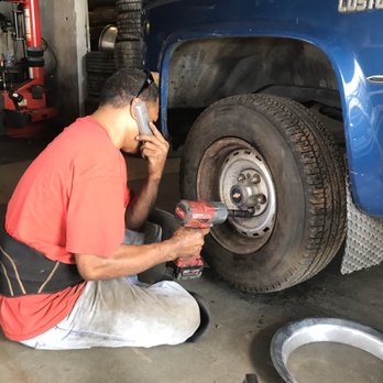 10 Dollar Tires - Malo multitasking servicing my truck and helping a customer on the phone - Tires Near Me - Waianae, Hawaii 10 Dollar Tires - Malo multitasking servicing my truck and helping a customer on the phone - Tires Near Me - Waianae, Hawaii