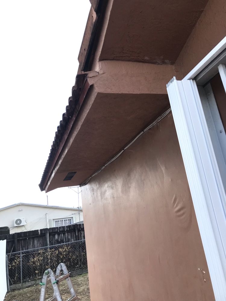 Slide of Red River Roofing