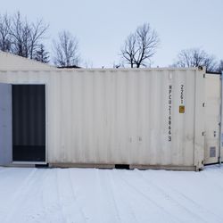 Out of Site Storage - modified 20' with man door