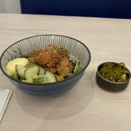 Karaage Donburi with a side of pickled jalapeños