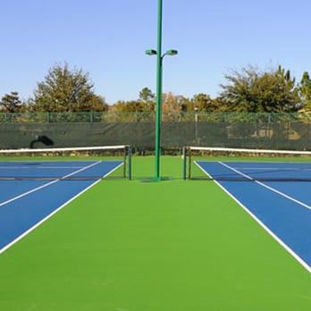 Sport Surfaces - a blue and green tennis court - General Contractors Near Me - West Palm Beach, Florida Sport Surfaces - a blue and green tennis court - General Contractors Near Me - West Palm Beach, Florida