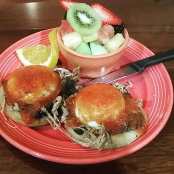 Blackbird Café - The Benchero egg Benedict with sliced fruit - Cafes Near Me - Long Beach, California Blackbird Café - The Benchero egg Benedict with sliced fruit - Cafes Near Me - Long Beach, California