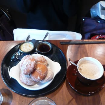 Monsoon Bellevue - Sesame seed beignets with five spice, maple syrup, banana cream - Vietnamese Near Me - Bellevue, Washington Monsoon Bellevue - Sesame seed beignets with five spice, maple syrup, banana cream - Vietnamese Near Me - Bellevue, Washington