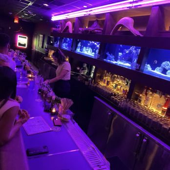 Brother's Keeper - Tables are available, but we loved sitting at the bar watching the fish tanks.  Bartenders were engaging and attentive. - Dive Bars Near Me - Miami Beach, Florida
